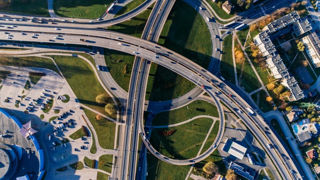 pexels-photo-681347 Aerial photograph of a complex highway interchange, capturing dynamic city traffic.